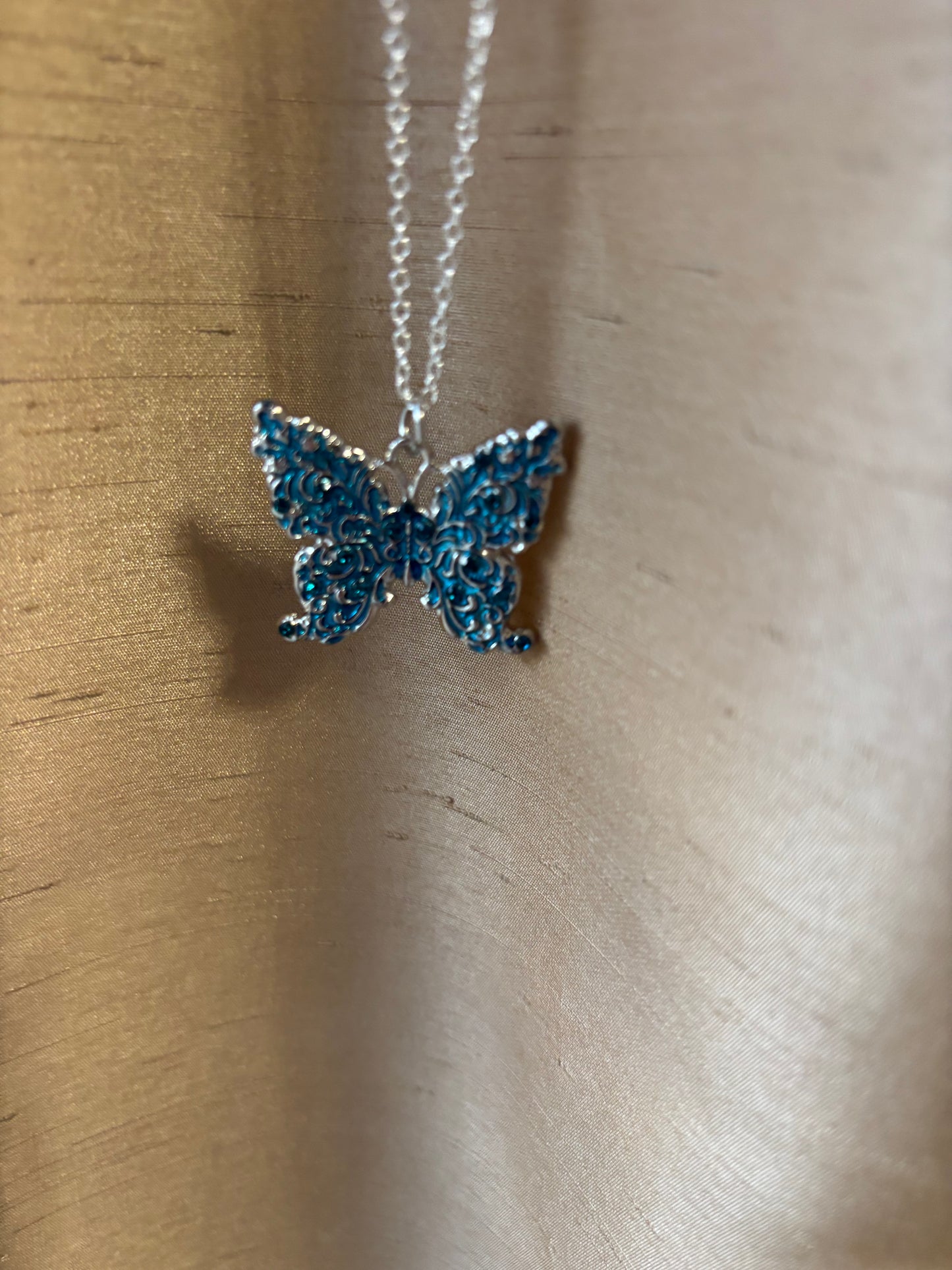 Blue butterfly necklace